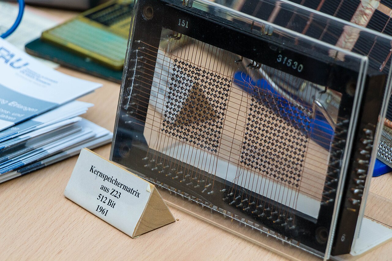 A core memory matrix from a Zuse Z23, labelled 512 bit, 1961: a grid of tiny ferrite rings on fine wires