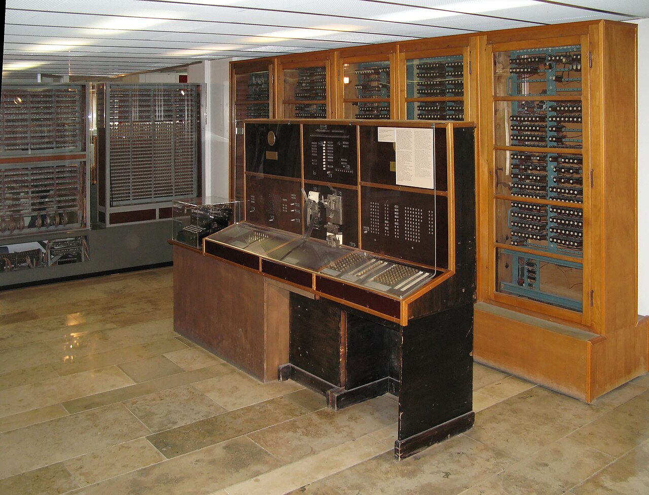 The Zuse Z4 at the Deutsches Museum: cabinets of relays and mechanical memory with a control desk